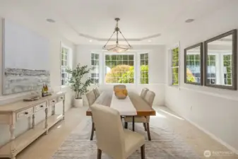 Formal dining room with a great view of the outdoors.