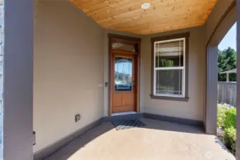 Covered front entry with space for seating