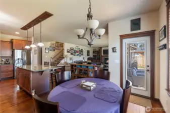 Nook leads to covered back patio while being open to main room