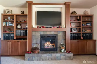Upgraded built ins during construction around fireplace and tv
