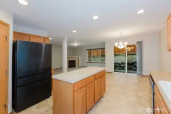Kitchen featuring island and stainless-steel appliances.