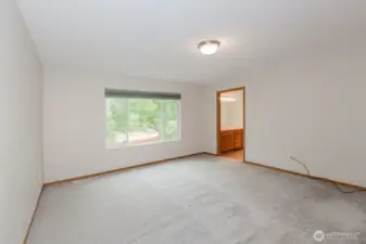 Bedroom overlooking backyard.