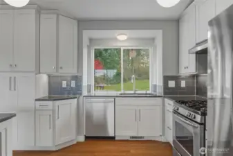 View of private backyard from kitchen