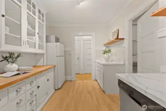 Spacious kitchen with butler doors to the dining room