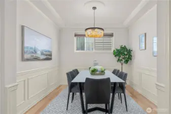 An elegant formal dining room offers the perfect setting for hosting memorable dinners and celebrations.