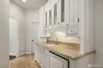 Large serving counter with2 warming drawers, Asko Dishwasher, walk in pantry, and in-ground wine cellar with up to 1000 bottle capacity