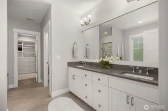 Large primary bathroom with soaking tub, shower, and a water closet (WC)