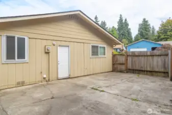 back yard pedestrian door to garage, washer/dryer and standalone bedroom