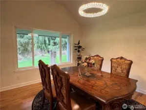 Elegant formal dining room designed for memorable gatherings and plenty of natural light to complement every occasion.
