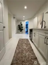 The basement includes a refreshment area that includes a sink, mini fridge and ice maker - great for hanging out and entertaining friends and family.
