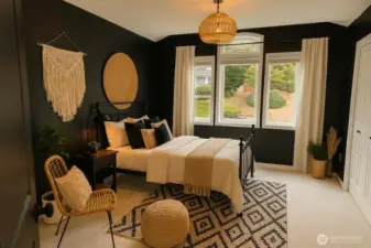 Oversized Bedroom #2 (window looking out to the front of the house). Has dual closets. Brand new carpet installed. Virtually Staged including chandelier