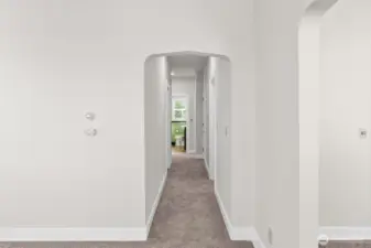 Upper-level looking down the hallway toward bathroom.