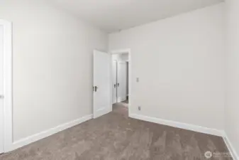 Upper level bedroom (one of three).
