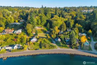 Easement off Beach Drive ... coming from Olney, the easement is on the right before you pass Lidstrom Rd.   Easy access to shopping locally, about 10 minutes to Southworth Ferry and 8 minutes to Hwy 16.  Rare opportunity to own land on BEACH DRIVE.