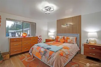 Recently updated, floating cabinetry throughout stays..