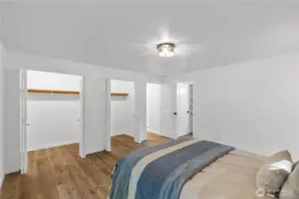 Primary bedroom with large double closets.