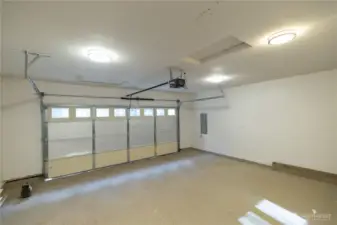 Double car garage with epoxy floor.