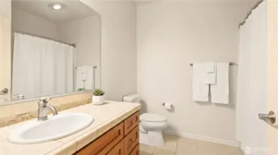 Guest bathroom with shower tub combo