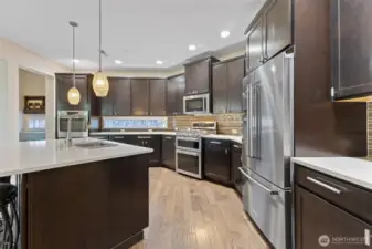 Huge kitchen with large island all newer stainless appliances Built in oven and microwave Quartz counters Soft close and your own butler's pantry