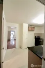 View of Kitchen & Living Room from Laundry /Mud Room