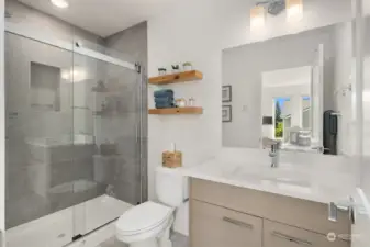 Primary bathroom with luxury finishes.