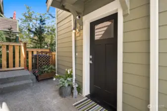 From the covered front porch, you will enter into the office/mudroom/flex space before heading up to the main level.