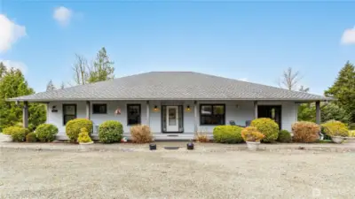 Beautiful custom home with a 50 year Presidential Roof.