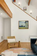 This pretty shot of a corner of the living room conceals a staircase leading to another gem of this spectacular home – a sunny walk-out flex room, plus a separate heated workshop and storage space that includes a professional dog bath and a door to the fenced back yard.