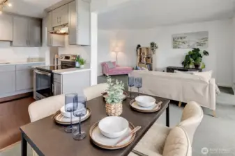 Invite friends over, enjoy the cozy comfort of the living space, and share unforgettable sunsets over the canal and Ballard.