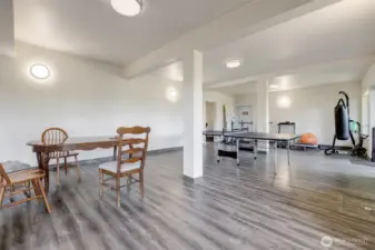 A ping-pong match, or a birthday gathering, the shared space downstairs has room for it all — and maybe a new neighbor-friend too!