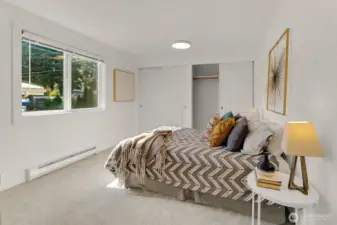 Generous bedroom has full wall closet and new carpet.