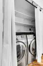 Your in-unit laundry has beautiful Samsung washer and dryer, plus shelving for extra storage.