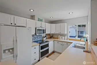 Lots of cupboard space in this kitchen. If you like to bake, you will like the double oven.