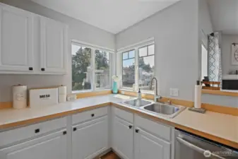 Look at all of the natural light that comes into the kitchen!