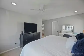 Walk in closet off primary along with access to the bathroom.