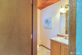 Lower level half bath off of the bedroom.