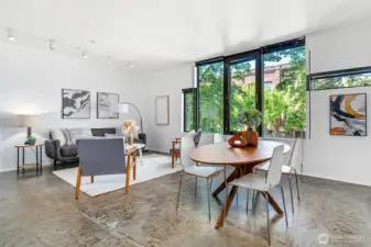 Spacious, bright and airy with 9' ceilings, this modern Capitol Hill condo provides an in-city retreat with large windows and aesthetically pleasing concrete floor.