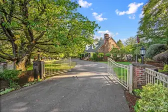 Imagine arriving home to this peaceful, tree-lined driveway.