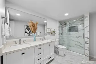 Renovated en-suite with double vanity and walk-in shower