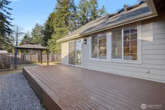Large composite deck off the great room with plenty of space for entertaining and relaxing.