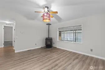 Heatilator Pellet Stove is getting a new Auger Motor that the Seller has already paid for and is scheduled to be installed on March 3rd!  This room is perfect.  A little smaller than the Living Room and away from the front doo, in fact, right by the Laundry Room where you can make a quick escape to a (nearly) fully enclosed cedar deck!  This Family Room is absolutely the coziest room in the home.