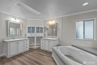 Vaulted Ceiling and a skylight to keep it well-lit with natural light.