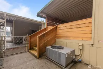 After you walk through the gate, there are 5 stairs to get you to the Backyard where you can find a Fully-Fenced area that has a Gazebo and a Storage Shed.  The Heat Pump is for both Heating and Cooling!  Easy access to  the back yard from the deck.  Solid deck!