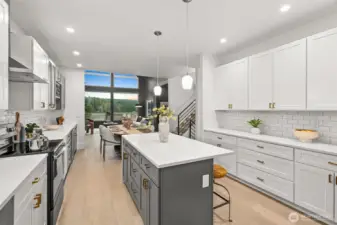 A true chef’s kitchen—beautiful custom cabinetry and room to bring your culinary creativity to life.