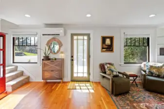 A cozy front entry leads into the lovely living room with lots of natural light. Brand new can lighting is a perfect addition to evening time lighting needs. Original Douglas fir hardwood flooring has been refurbished and adds character and style to this adorable home.