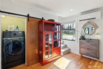 The original washer and dryer were in the lower level accessed only by the outside stairway.  This is the perfect plan to keep utility needs on the main level.
