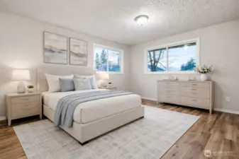 Guest suite on Main Level. Virtually staged.