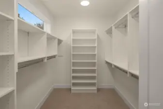 Primary suite walk-in closet.