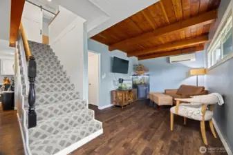 There is a family room on the main floor that also has the wood ceiling and a mini split for heating and cooling.
