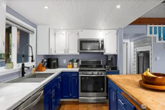 Looking at the kitchen, you will see there is a lot of cabinets and counter space.